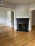 204-206 Bonaccord Street, Moncton, NB  - Indoor Photo Showing Living Room With Fireplace 