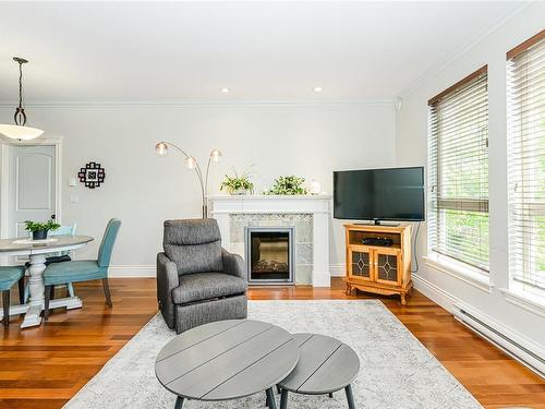 201-755 Goldstream Ave, Langford, BC - Indoor Photo Showing Living Room With Fireplace