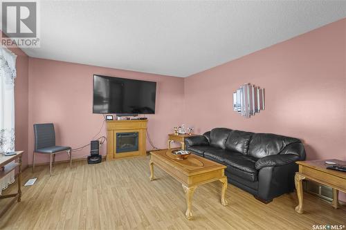 6307 1St Avenue N, Regina, SK - Indoor Photo Showing Living Room With Fireplace