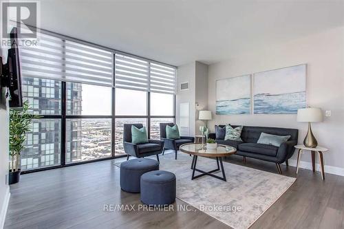 2807 - 2910 Highway 7, Vaughan, ON - Indoor Photo Showing Living Room