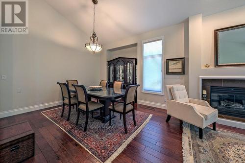 3971 Gallaghers Circle Lot# 44, Kelowna, BC - Indoor Photo Showing Dining Room With Fireplace