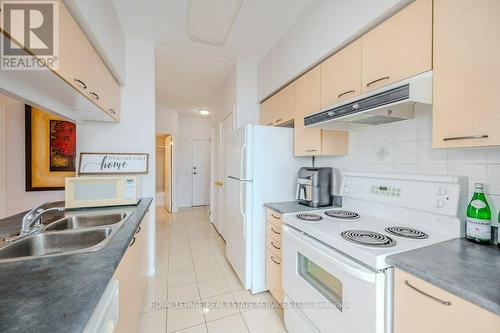 Ph09 - 51 Times Avenue, Markham, ON - Indoor Photo Showing Kitchen With Double Sink