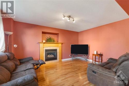 16 Manoir Street, Embrun, ON - Indoor Photo Showing Living Room With Fireplace