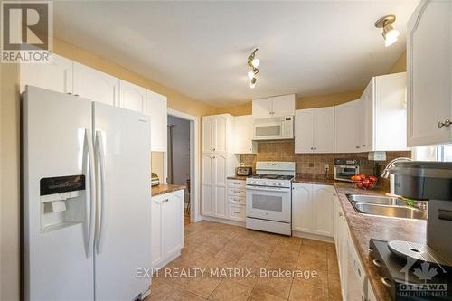 16 Manoir Street, Russell, ON - Indoor Photo Showing Kitchen With Double Sink