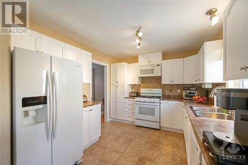 16 Manoir Street, Embrun, ON - Indoor Photo Showing Kitchen With Double Sink