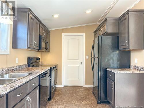 14 Ivory Court, Woodstock, NB - Indoor Photo Showing Kitchen With Double Sink