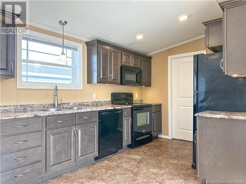 14 Ivory Court, Woodstock, NB - Indoor Photo Showing Kitchen With Double Sink