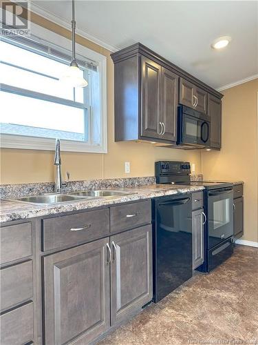 14 Ivory Court, Woodstock, NB - Indoor Photo Showing Kitchen With Double Sink