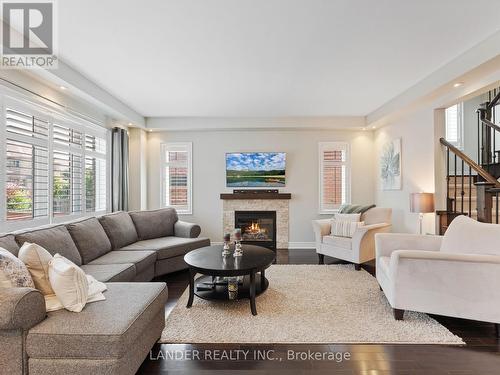 13 Coach Crescent, Whitby, ON - Indoor Photo Showing Living Room With Fireplace