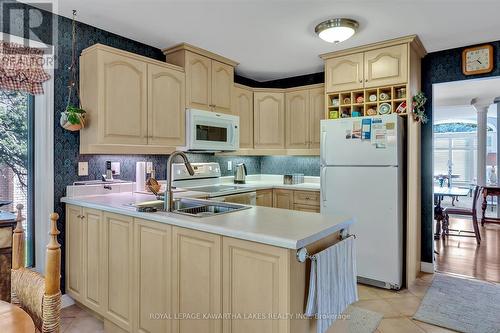 3 Squires Row, Kawartha Lakes (Bobcaygeon), ON - Indoor Photo Showing Kitchen With Double Sink