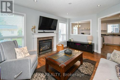 452 Greenwood Drive, Essa, ON - Indoor Photo Showing Living Room With Fireplace