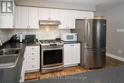 452 Greenwood Drive, Essa, ON - Indoor Photo Showing Kitchen With Double Sink