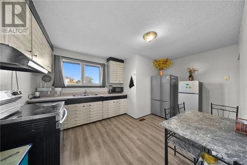 1157-1159 Paquette Street, Greater Sudbury, ON - Indoor Photo Showing Kitchen With Double Sink