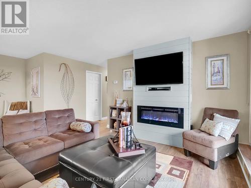 2303 - 323 Colborne Street, London, ON - Indoor Photo Showing Living Room With Fireplace