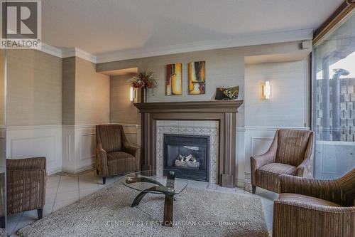 2303 - 323 Colborne Street, London, ON - Indoor Photo Showing Living Room With Fireplace