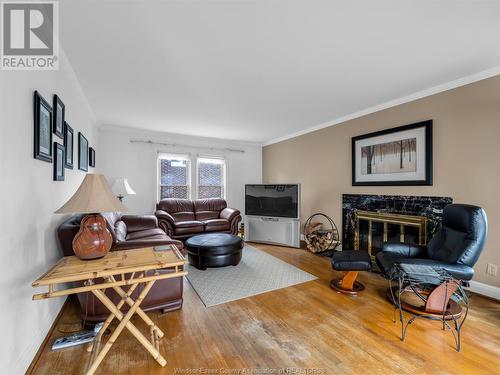 1201 Pelissier Street, Windsor, ON - Indoor Photo Showing Living Room With Fireplace