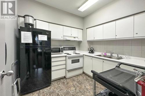 1209 - 711 Rossland Road E, Whitby (Pringle Creek), ON - Indoor Photo Showing Kitchen With Double Sink