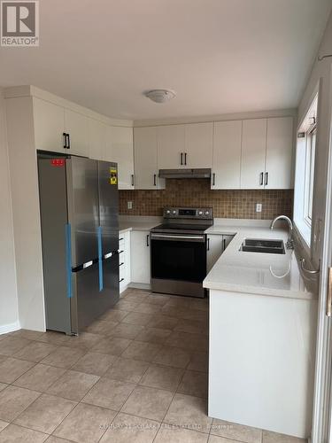 5640 Rosaline Road, Burlington, ON - Indoor Photo Showing Kitchen With Double Sink