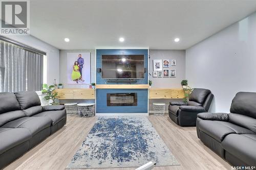 275 Trudelle Crescent, Regina, SK - Indoor Photo Showing Living Room With Fireplace