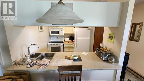 17 Carrier Street, Edmundston, NB - Indoor Photo Showing Kitchen With Double Sink