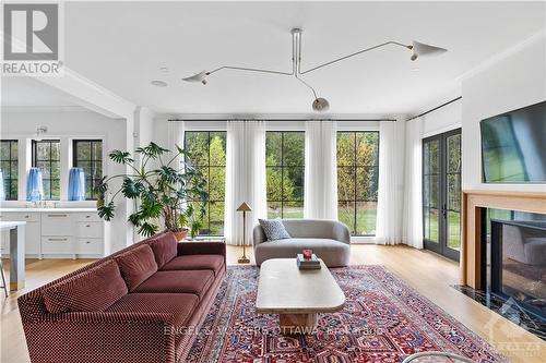 5808 Red Castle Ridge, Ottawa, ON - Indoor Photo Showing Living Room With Fireplace