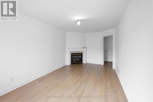 9 Hodgson Drive, Barrie, ON - Indoor Photo Showing Living Room With Fireplace