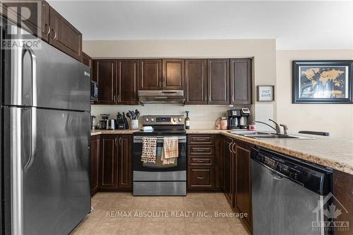 A - 573 Chapman Mills Drive, Ottawa, ON - Indoor Photo Showing Kitchen With Double Sink