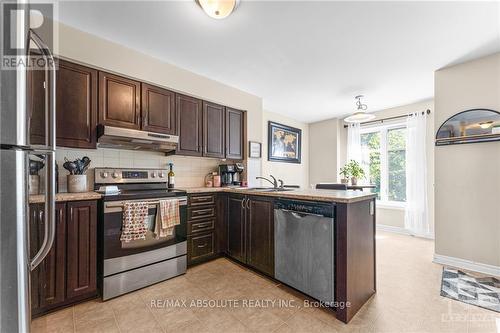 A - 573 Chapman Mills Drive, Ottawa, ON - Indoor Photo Showing Kitchen With Double Sink