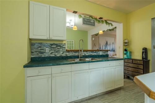 102 Harbison Avenue, Winnipeg, MB - Indoor Photo Showing Kitchen With Double Sink