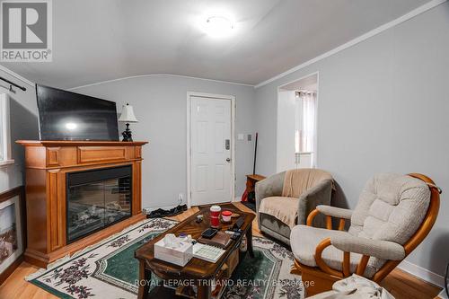 7 Marmora Street, London, ON - Indoor Photo Showing Living Room With Fireplace