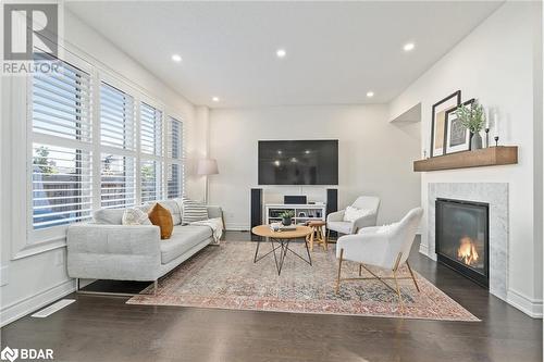 19 Mugford Crescent, Brampton, ON - Indoor Photo Showing Living Room With Fireplace