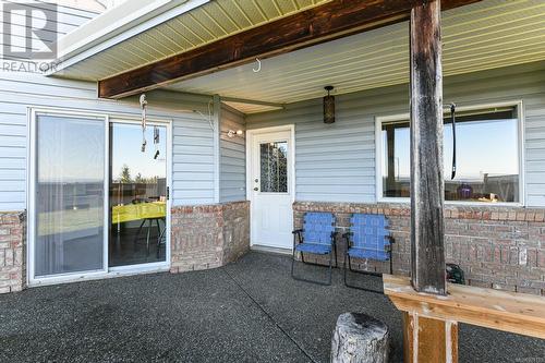 Granny suite entrance and patio - 5594 7Th St, Union Bay, BC - Outdoor With Deck Patio Veranda With Exterior