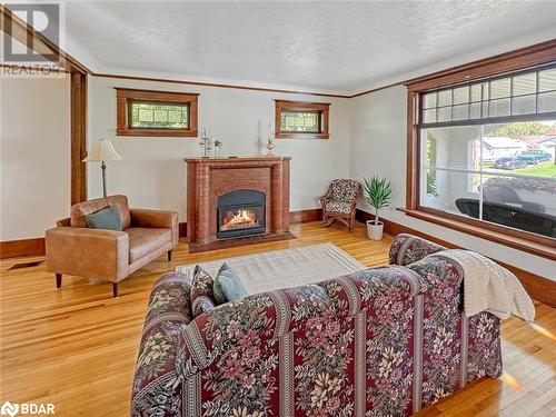 44 Mcgowan Street, Tweed, ON - Indoor Photo Showing Living Room With Fireplace