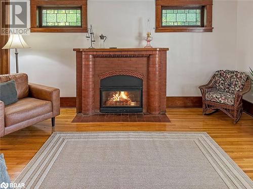 44 Mcgowan Street, Tweed, ON - Indoor Photo Showing Living Room With Fireplace