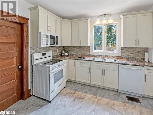 44 Mcgowan Street, Tweed, ON - Indoor Photo Showing Kitchen With Double Sink