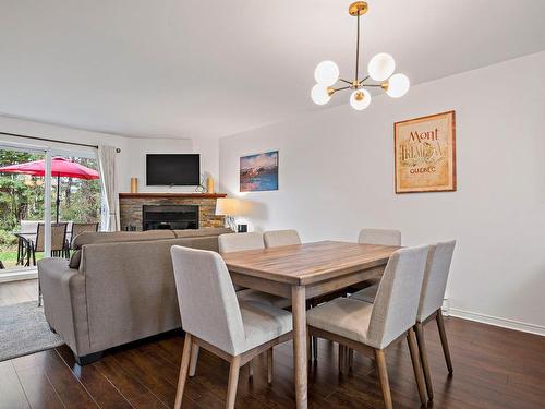 Dining room - 1756 Ch. Du Golf, Mont-Tremblant, QC - Indoor Photo Showing Dining Room With Fireplace