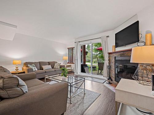 Living room - 1756 Ch. Du Golf, Mont-Tremblant, QC - Indoor Photo Showing Living Room With Fireplace