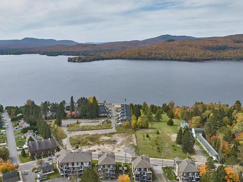 Aerial photo - 102-289 Rue Principale, Saint-Donat, QC - Outdoor With Body Of Water With View