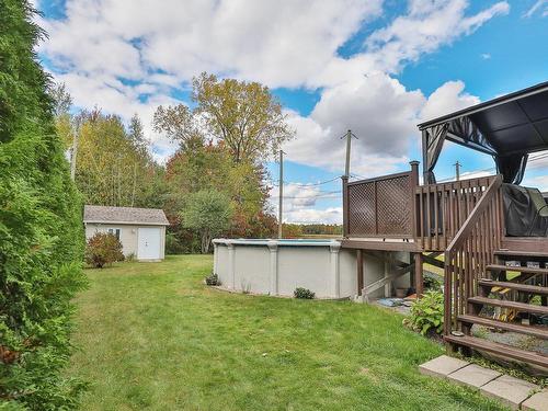 Backyard - 24 Rue William, Lanoraie, QC - Outdoor With Above Ground Pool