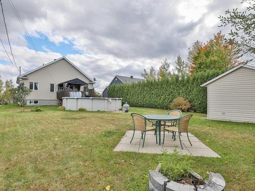 Backyard - 24 Rue William, Lanoraie, QC - Outdoor With Above Ground Pool With Backyard