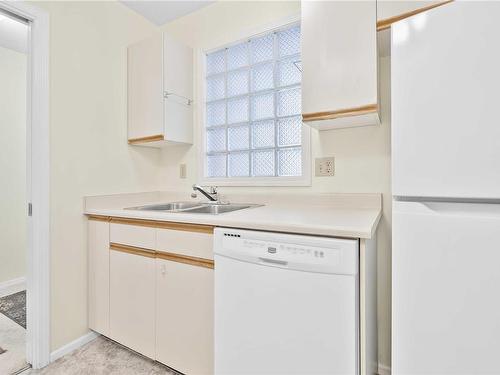 202-2373 Henry Ave, Sidney, BC - Indoor Photo Showing Kitchen With Double Sink