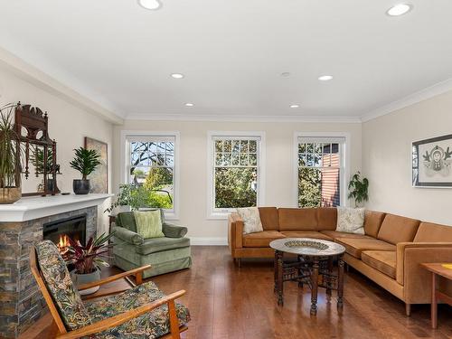 4-523 Su'It St, Victoria, BC - Indoor Photo Showing Living Room With Fireplace