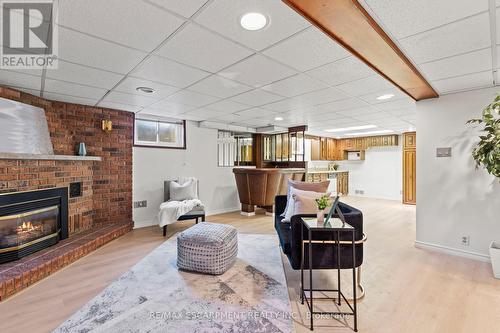 12 Broderick Avenue, Thorold, ON - Indoor Photo Showing Living Room With Fireplace