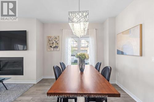 41 Starling Drive, Hamilton, ON - Indoor Photo Showing Dining Room With Fireplace