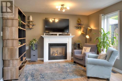 258 Keewatin Avenue, Kitchener, ON - Indoor Photo Showing Living Room With Fireplace