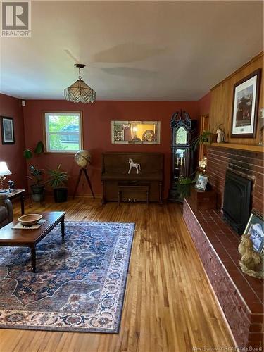 43 Gordon Street, Sussex, NB - Indoor Photo Showing Living Room With Fireplace