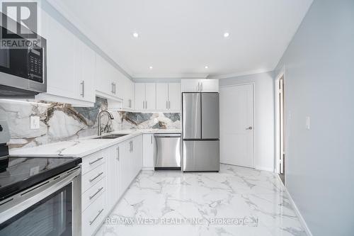 614 - 5 Shady Golfway, Toronto, ON - Indoor Photo Showing Kitchen With Stainless Steel Kitchen