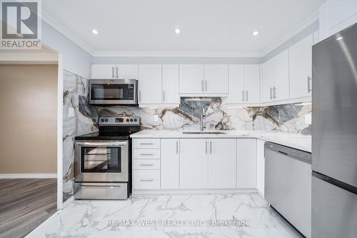 614 - 5 Shady Golfway, Toronto, ON - Indoor Photo Showing Kitchen With Stainless Steel Kitchen