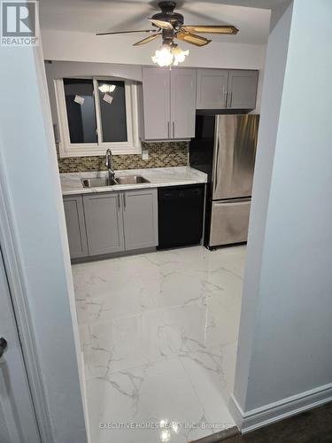 1411 Beaverbrook Court, Oshawa, ON - Indoor Photo Showing Kitchen With Double Sink