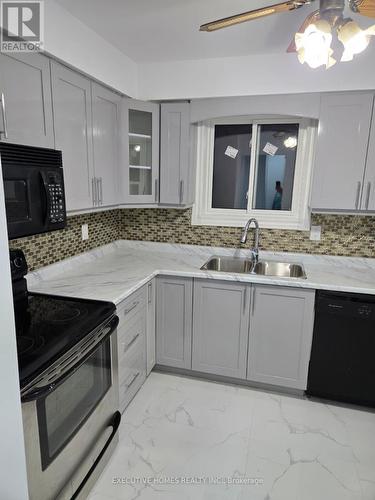 1411 Beaverbrook Court, Oshawa, ON - Indoor Photo Showing Kitchen With Double Sink